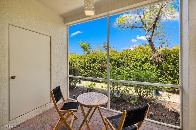 1305 Sweetwater Cv Unit 104, Naples, FL 34110 - view of sunroom / solarium
