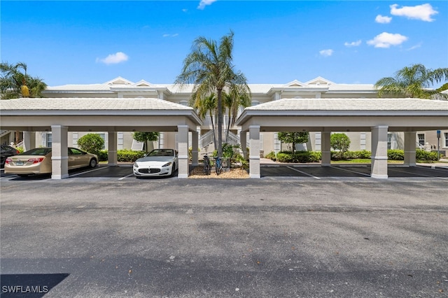 1305 Sweetwater Cv Unit 104, Naples, FL 34110 - view of covered parking lot
