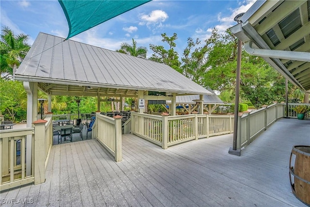 3129 Preserves Edge Ct, Fort Myers, FL 33905 - wooden terrace featuring a gazebo and outdoor dining area