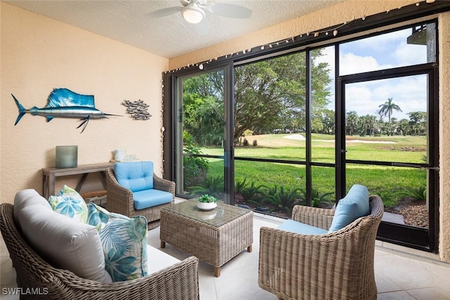 7048 Pelican Bay Blvd Unit C104, Naples, FL 34108 - sunroom with a ceiling fan, an outdoor hangout area, and golf course view