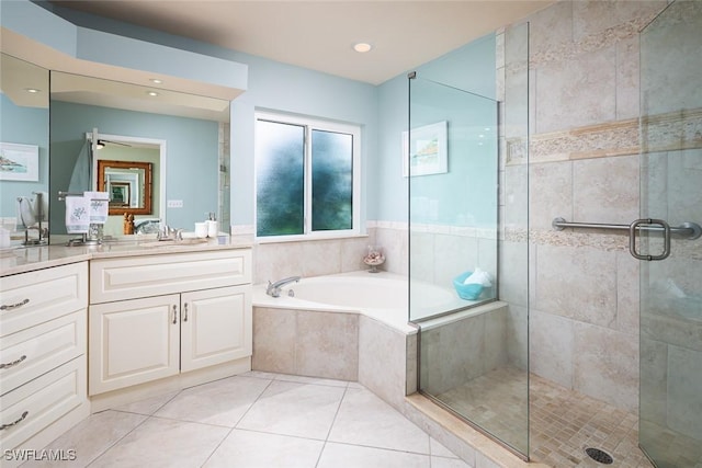 7048 Pelican Bay Blvd Unit C104, Naples, FL 34108 - bathroom with a garden tub, vanity, tile patterned floors, a shower stall, and a ceiling fan