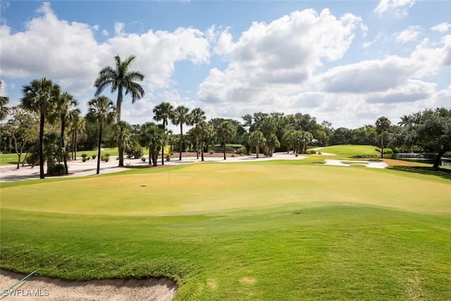 7048 Pelican Bay Blvd Unit C104, Naples, FL 34108 - surrounding community with golf course view