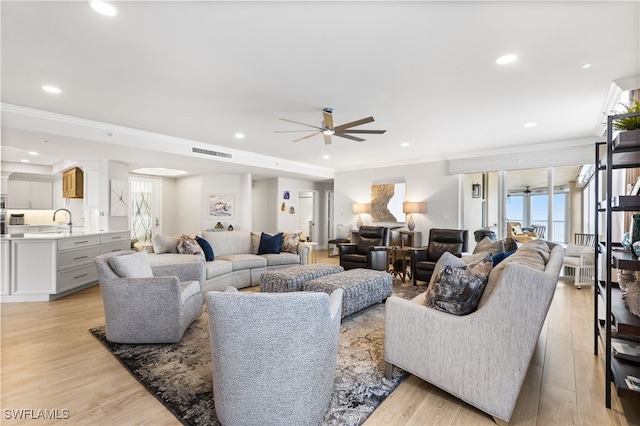 14250 Royal Harbour Ct Unit 913, Fort Myers, FL 33908 - living area with a ceiling fan, ornamental molding, recessed lighting, and light wood-type flooring