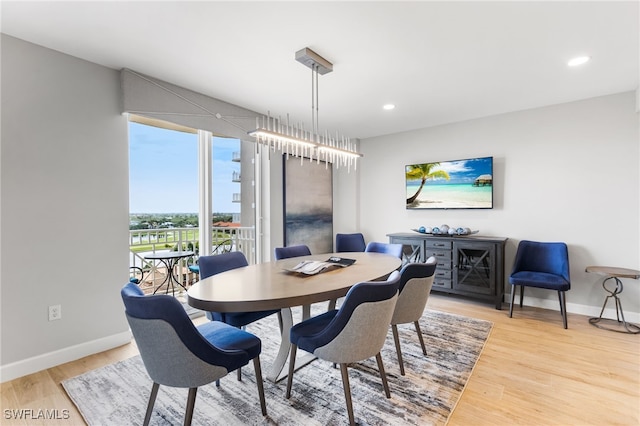 14250 Royal Harbour Ct Unit 913, Fort Myers, FL 33908 - dining area with light wood-style flooring, baseboards, and recessed lighting