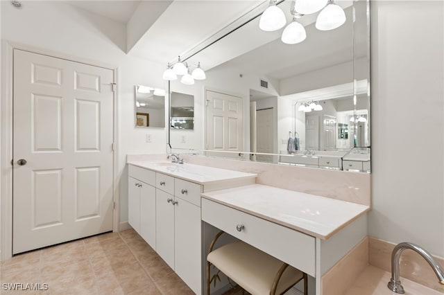14250 Royal Harbour Ct Unit 913, Fort Myers, FL 33908 - bathroom featuring a chandelier, vanity, and tile patterned floors