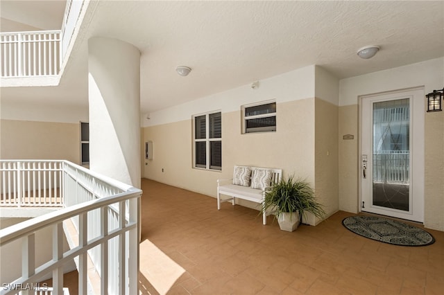 14250 Royal Harbour Ct Unit 913, Fort Myers, FL 33908 - view of exterior entry featuring stucco siding