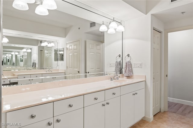 14250 Royal Harbour Ct Unit 913, Fort Myers, FL 33908 - bathroom featuring vanity, tile patterned flooring, a closet, and baseboards