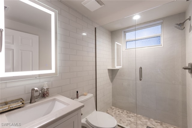 14250 Royal Harbour Ct Unit 913, Fort Myers, FL 33908 - full bath featuring a stall shower, toilet, vanity, and tile walls