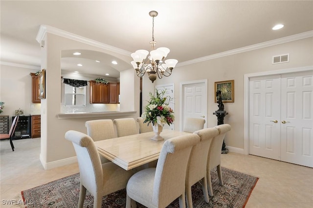 28666 San Lucas Ln Unit 102, Bonita Springs, FL 34135 - dining space featuring visible vents, ornamental molding, baseboards, and a chandelier