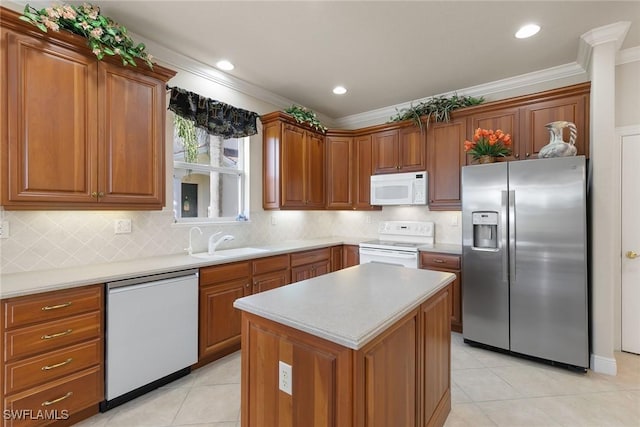 28666 San Lucas Ln Unit 102, Bonita Springs, FL 34135 - kitchen featuring a sink, light tile patterned flooring, white appliances, and ornamental molding