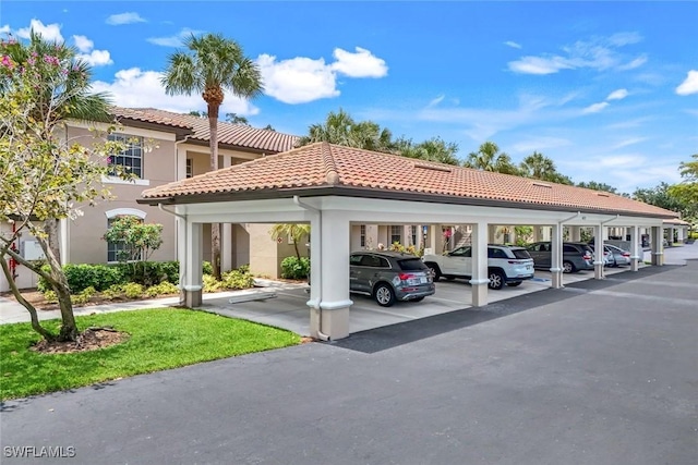 4651 Turnberry Lake Dr Unit 201, Estero, FL 33928 - view of covered parking lot