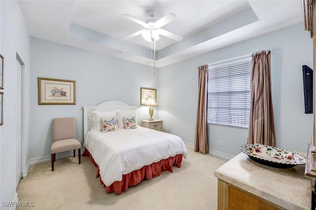 4651 Turnberry Lake Dr Unit 201, Estero, FL 33928 - bedroom featuring baseboards, light carpet, and a tray ceiling