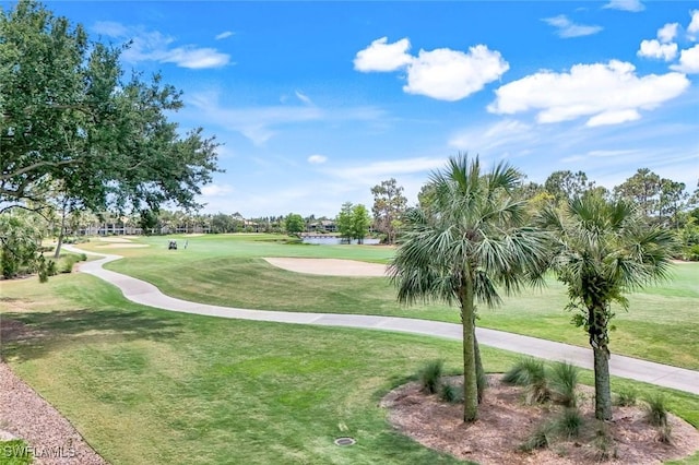 4651 Turnberry Lake Dr Unit 201, Estero, FL 33928 - view of community with a lawn, a water view, and golf course view