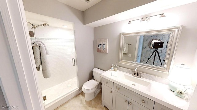 6805 Satinleaf Rd S Unit 201, Naples, FL 34109 - bathroom featuring tile patterned floors, a stall shower, toilet, and vanity