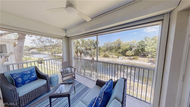 6805 Satinleaf Rd S Unit 201, Naples, FL 34109 - sunroom with ceiling fan and a water view