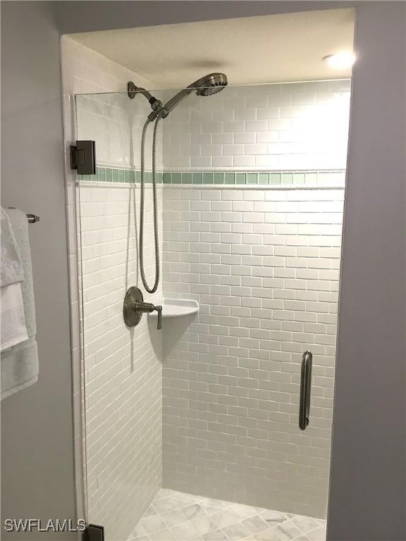 6805 Satinleaf Rd S Unit 201, Naples, FL 34109 - full bath with a stall shower