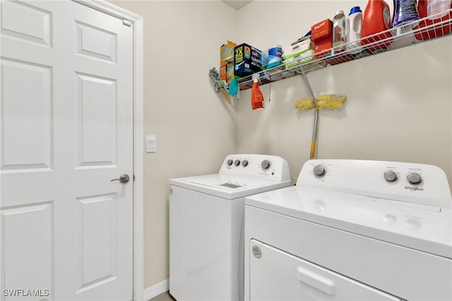 226 NW 4th Ter, Cape Coral, FL 33993 - washroom featuring washer and dryer and laundry area