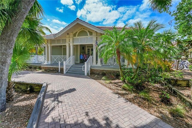 coastal inspired home with a porch