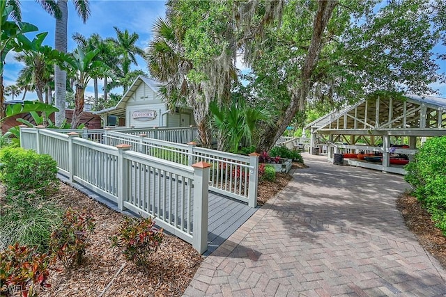 view of home's community featuring fence and a gazebo