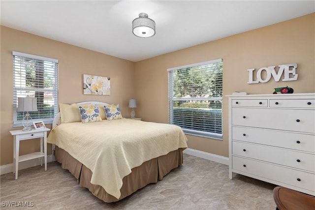 bedroom with baseboards