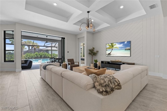 16198 Verilyn Cir, Naples, FL 34110 - living room with baseboards, coffered ceiling, light wood-style flooring, recessed lighting, and beamed ceiling