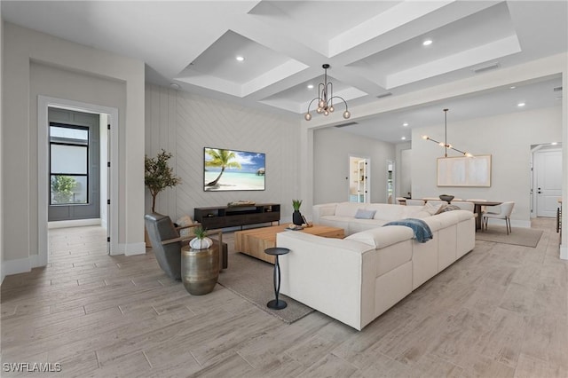 16198 Verilyn Cir, Naples, FL 34110 - living room featuring a chandelier, light wood-type flooring, baseboards, coffered ceiling, and recessed lighting