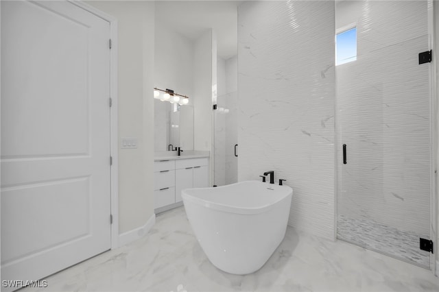 full bathroom featuring a soaking tub, vanity, marble finish floor, and a marble finish shower