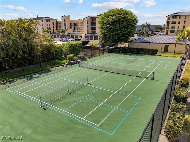 4719 SE 17th Pl Unit 208, Cape Coral, FL 33904 - view of tennis court with fence