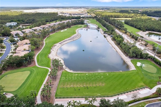 drone / aerial view with a water view and a residential view