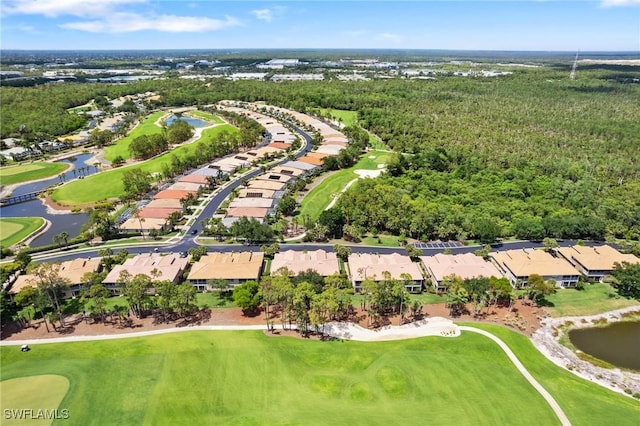 birds eye view of property with a water view, golf course view, and a residential view