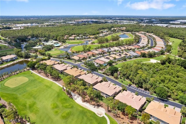 birds eye view of property with a residential view, a water view, and golf course view
