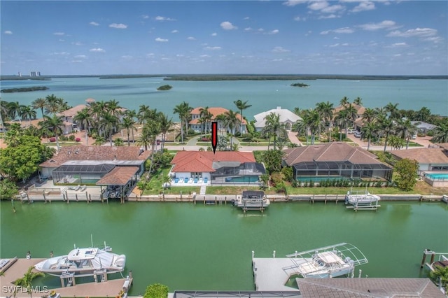 aerial view with a residential view and a water view