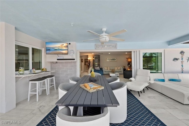 view of patio with outdoor lounge area and ceiling fan