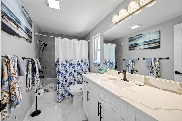 full bathroom with toilet, marble finish floor, shower / bath combo, and vanity