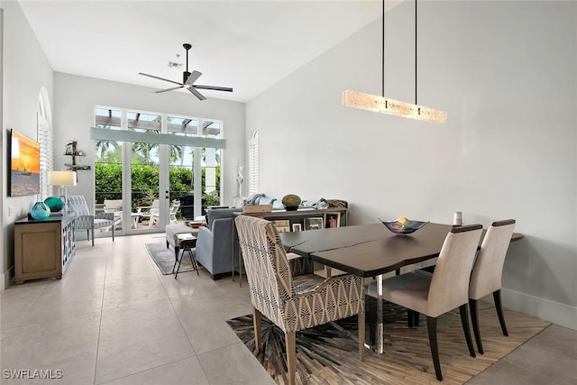 1603 Curlew Ave Unit 1603, Naples, FL 34102 - dining area with ceiling fan, french doors, baseboards, a towering ceiling, and visible vents