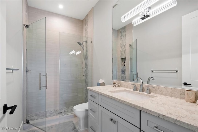1603 Curlew Ave Unit 1603, Naples, FL 34102 - bathroom with toilet, recessed lighting, a shower stall, and vanity