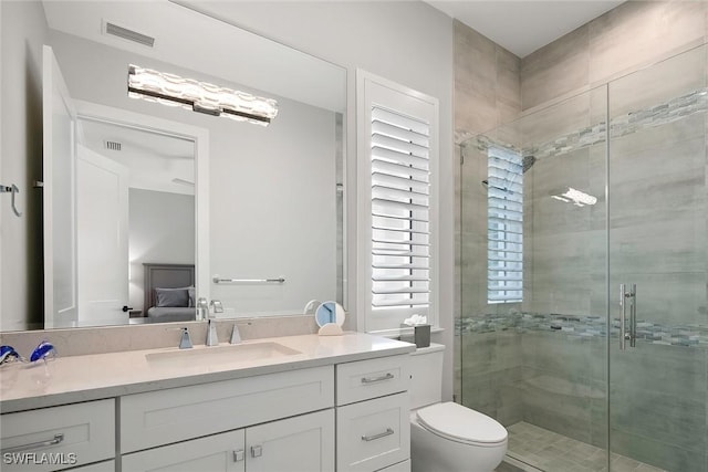 1603 Curlew Ave Unit 1603, Naples, FL 34102 - ensuite bathroom featuring visible vents, vanity, ensuite bath, and a shower stall