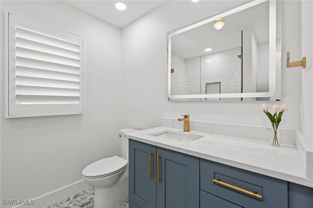 270 Dundee Rd, Fort Myers Beach, FL 33931 - bathroom with walk in shower, vanity, toilet, recessed lighting, and baseboards
