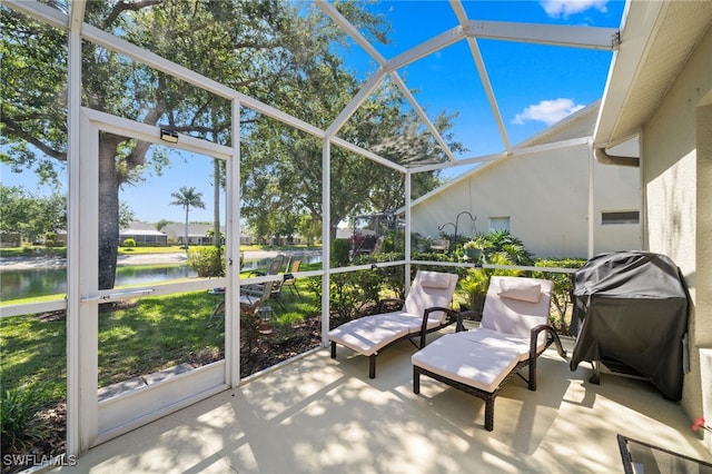 8188 Tauren Ct Unit N342, Naples, FL 34119 - sunroom featuring a water view