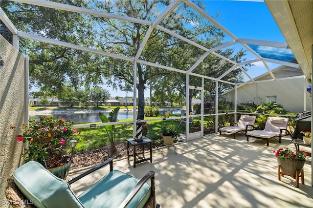 8188 Tauren Ct Unit N342, Naples, FL 34119 - unfurnished sunroom with a water view
