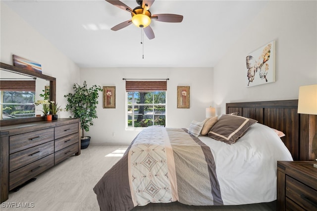 8188 Tauren Ct Unit N342, Naples, FL 34119 - bedroom featuring lofted ceiling and a ceiling fan