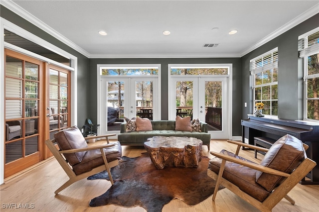 sunroom / solarium with french doors and visible vents