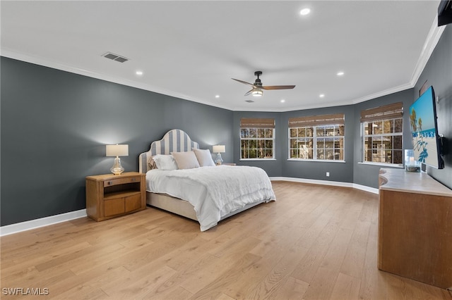 bedroom with recessed lighting, ornamental molding, light wood finished floors, and visible vents