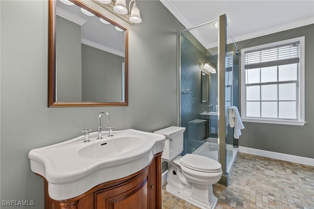 full bath with crown molding, a shower stall, vanity, baseboards, and toilet