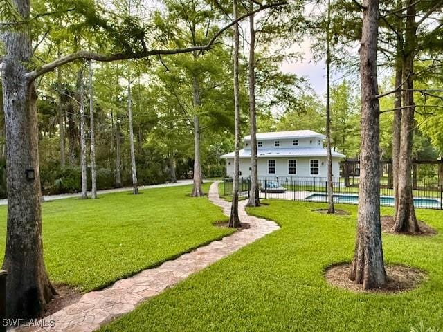 5271 Cherry Wood Dr, Naples, FL 34119 - view of property's community with a pool
