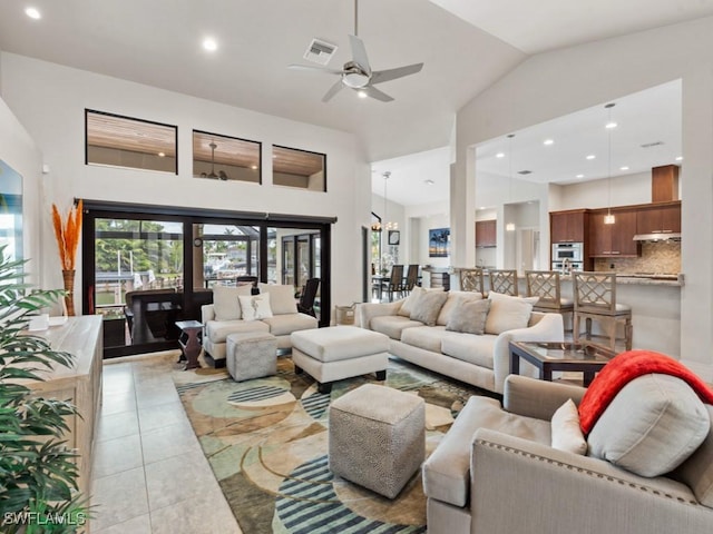 580 Goldcoast Ct, Marco Island, FL 34145 - living room featuring ceiling fan, high vaulted ceiling, recessed lighting, light tile patterned floors, and visible vents