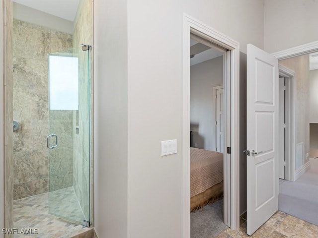 580 Goldcoast Ct, Marco Island, FL 34145 - ensuite bathroom featuring connected bathroom and a stall shower