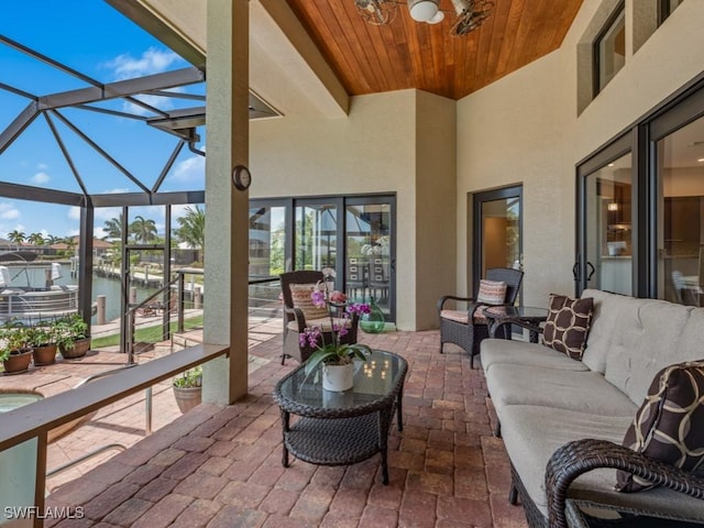 580 Goldcoast Ct, Marco Island, FL 34145 - sunroom / solarium with a water view and an outdoor hangout area