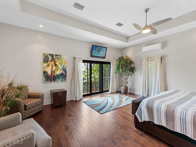 580 Goldcoast Ct, Marco Island, FL 34145 - bedroom with an AC wall unit, baseboards, visible vents, and a raised ceiling