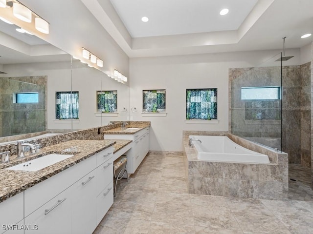 580 Goldcoast Ct, Marco Island, FL 34145 - full bath featuring a garden tub, recessed lighting, a walk in shower, and vanity